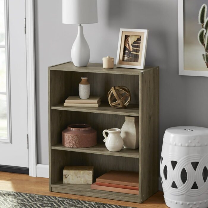 Mainstays-3-Shelf-Bookcase-with-Adjustable-Shelves-Rustic-Oak_90f44aa9-e46b-41e3-94cf-f1a320762d83.3dab15909794320c22c490f4c24566fe.jpeg